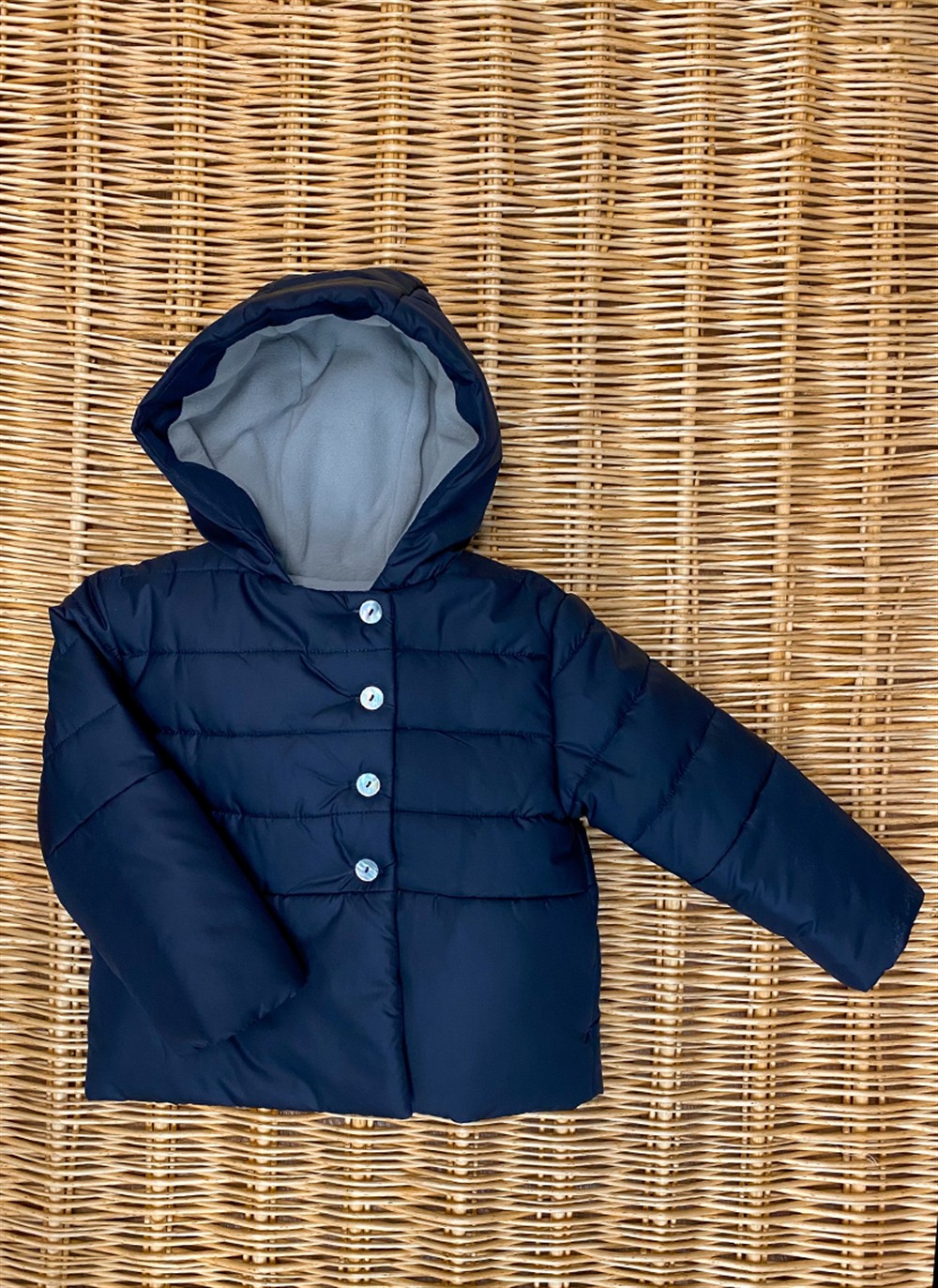 Giubbino con cappuccio blu con imbottitura pile e bottoni madreperla Baroni